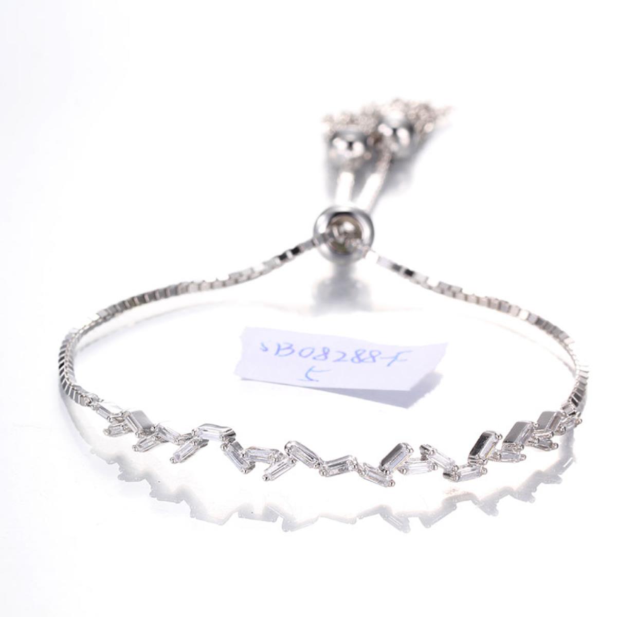 Sterling Silver Rhodium Baguette Cut Zigzag Tassel Adjustable Bracelet