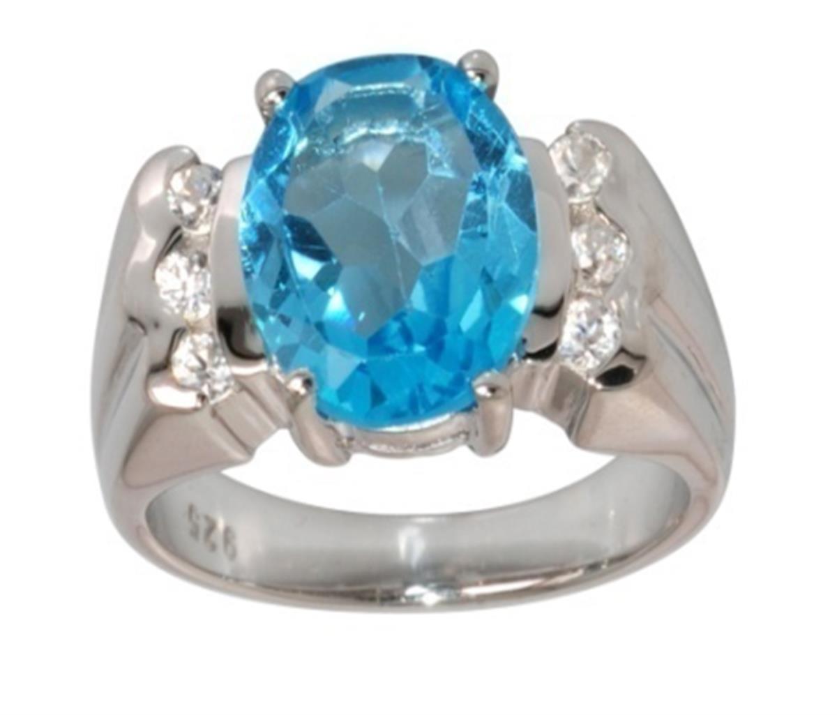 Sterling Silver Rhodium 11x9mm Oval Cut Sky Blue Topaz with Triple Rd White Zircon Sides Fashion Ring